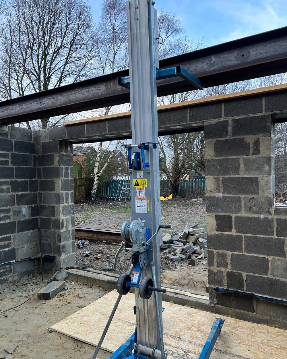 Half-built house extension by Barkerend Builders in Bradford, steel beam set over a new opening